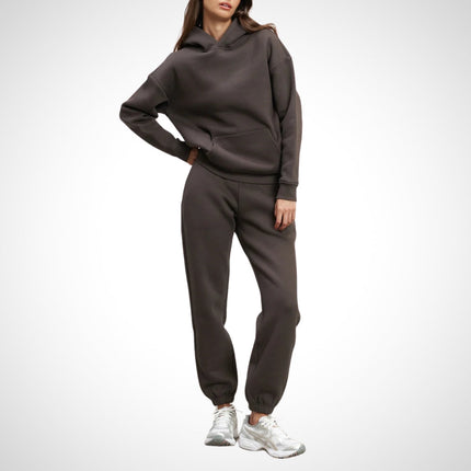 Damski zestaw do joggingu miejskiego | Stylowa bluza z kapturem i joggery | Miękki i oddychający bawełniany dres | Wszechstronny strój codzienny | Kieszeń kangurka i regulowany kaptur | Elastyczny pas i kieszenie boczne