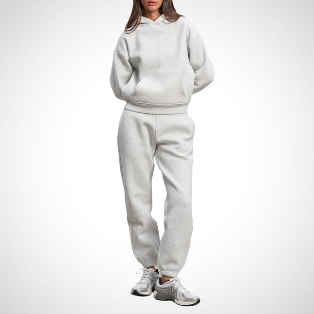 Damski zestaw do joggingu miejskiego | Stylowa bluza z kapturem i joggery | Miękki i oddychający bawełniany dres | Wszechstronny strój codzienny | Kieszeń kangurka i regulowany kaptur | Elastyczny pas i kieszenie boczne