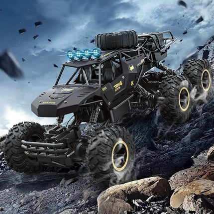 6-kołowy zdalnie sterowany Monster Truck w skali 1:12 | Możliwości terenowe | Zaawansowana technologia 2,4 GHz | Amortyzatory | Opony antypoślizgowe | Wysoka prędkość 52 km/h | Akumulator USB | Opcje czarno-złote