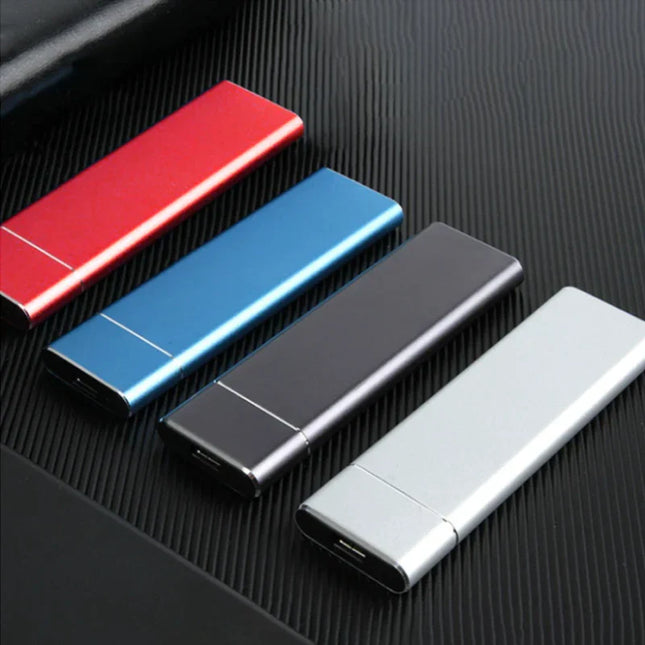 Rynka | Ultraszybki zewnętrzny dysk SSD | 520 MB/s | 1 TB/2 TB | USB 3.1 typu C | Odporne na wstrząsy aluminium | Kompaktowa konstrukcja | Zgodność z wieloma systemami inicjującymi | Srebrny/Czarny/Niebieski/Czerwony