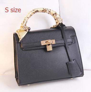 Modna damska torba ze skóry PU JASMIN NOIR | Crossbody z zamkiem szalika | Wzór Saffiano | Jednolity kolor | Zamknięcie na zamek | Wstążki i dekoracje z fredzlami | Wszechstronna torebka | Wewnętrzna kalibracja na telefonie | Rozmiar M/S